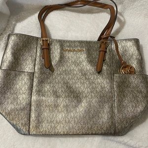 Michael Kors nice jet set travel tote. Metallic gold NWOT